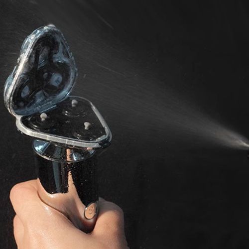 Shaving brush cleaning spray