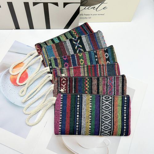 Retro ethnic style mobile phone bag, women's small wallet, wrist bag, simple hand-held striped fabric bag. Manufacturer's wholesale.