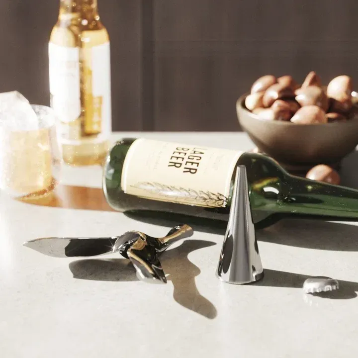 Elegant bird balance sculpture bottle opener