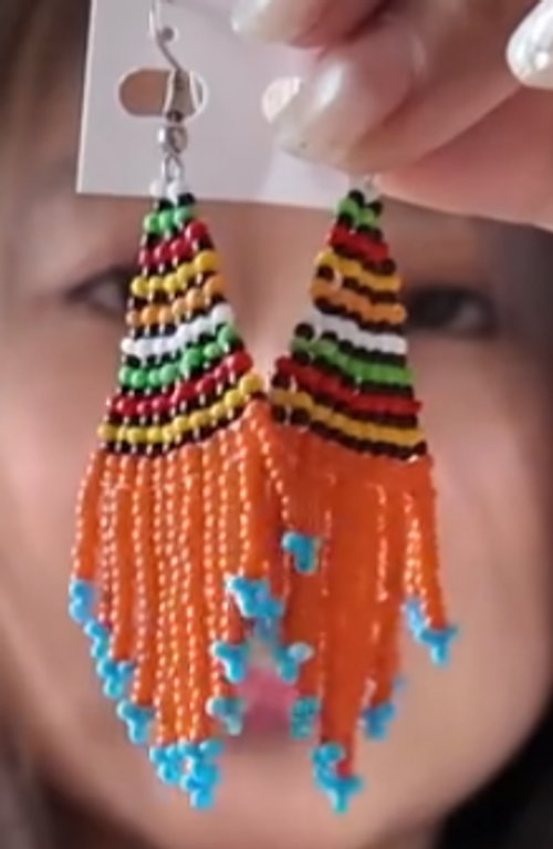 Hot-selling item! Bohemian-style colorful rice bead geometric long earrings, with bold colors, convey freedom and individuality.