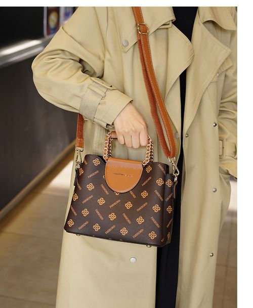 2025 new high-end women's handbag with floral patterns
