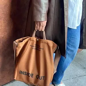 man and women's Canvas Tote Bag - Large Cotton Crossbody City Bag with Adjustable Strap, Multiple Pockets, Organizational Functionality