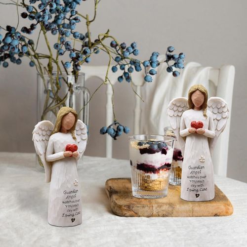 AUKEST guardian angel statue, holding a red heart, angel-themed gift.