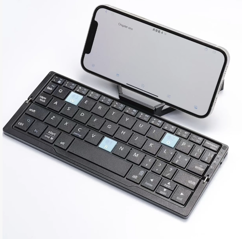 Teclado Bluetooth dobrável portátil. Dobrado para armazenamento,é pequeno e fácil de transportar. A carcaça metálica é resistente e durável. As teclas silenciosas proporcionam uma sensação confortável. Conecta-se rapidamente ao telefone móvel e ao tablet via Bluetooth. O toque é silencioso e confortável. Carregamento por cabo Type-C oferece longa duração da bateria. Inclui suporte embutido para dispositivo. Um pequeno teclado ideal para viagens de negócios, aulas online e trabalho no escritório.