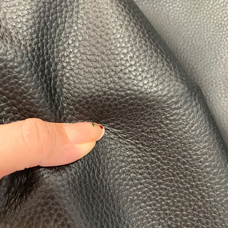 The first layer of cowhide pressure 7 lychee pattern can be used to make leather belts, bags, shoes, handmade leather leather leather