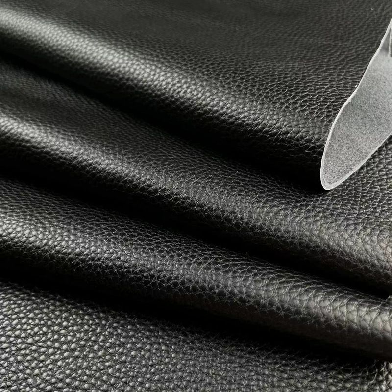 Black lychee-patterned top-grain cowhide with clear and textured patterns. Handmade leather goods such as bags, shoes, and other materials are durable. Leather of high quality.