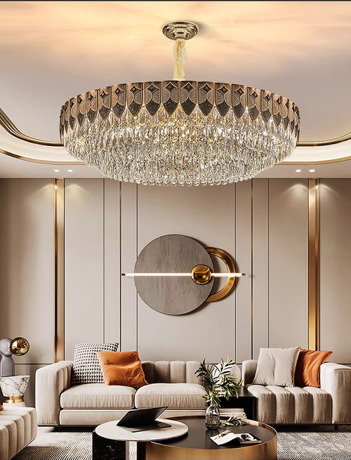 This light luxury crystal chandelier features a high-end gold lamp body paired with layered brilliant crystal design, with a magnificent and atmospheric overall shape. When lit up, it reflects a crystal clear and transparent lighting effect, easily enhancing the level of home space. Whether installed in the living room, bedroom, dining room, or hotel apartment, it can create a warm, elegant, and luxurious atmosphere.