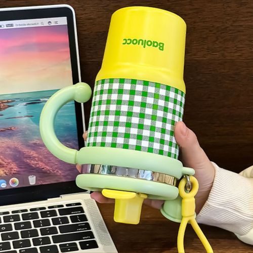 Insulated water bottle with straw, suitable for both hot and cold drinks, made of 304 stainless steel with handle.