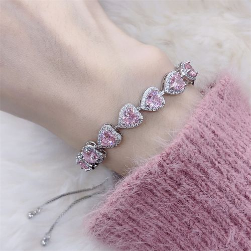 Pink heart-shaped, fully encrusted with sparkling cubic zirconia, adjustable stretch bracelet for women.