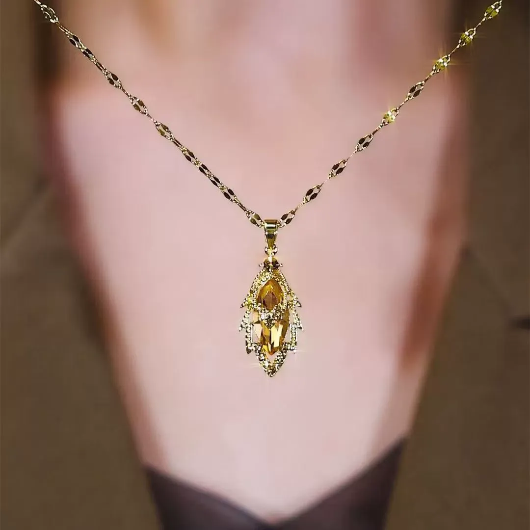 Titanium steel delicate zircon leaf pendant necklace for women.