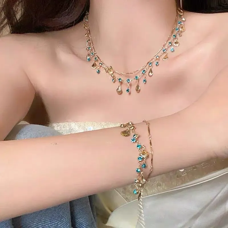 Daughter of the Sea ~ Blue Zircon Shell Necklace Bracelet