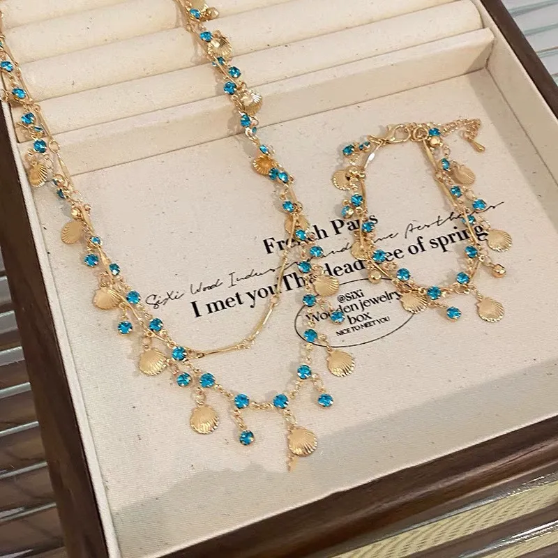 Daughter of the Sea ~ Blue Zircon Shell Necklace Bracelet