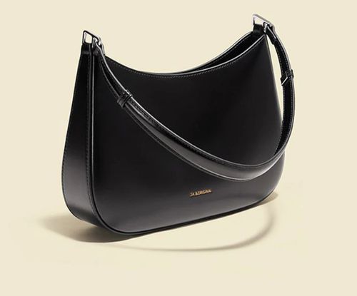 🖤 Where Elegance Meets Everyday 🖤 Luxury Looks. Daily Function. Zero Compromise.  Step into timeless style with our Minimal Luxe Shoulder Bag — ✨ Sleek two-tone design for effortless pairings ✨ Spacious interior for all your essentials ✨ Chic tassel & charm detailing ✨ Premium leather-look finish — soft, structured, and built to last  🎯 Perfect for work, weekends, and everything in between.