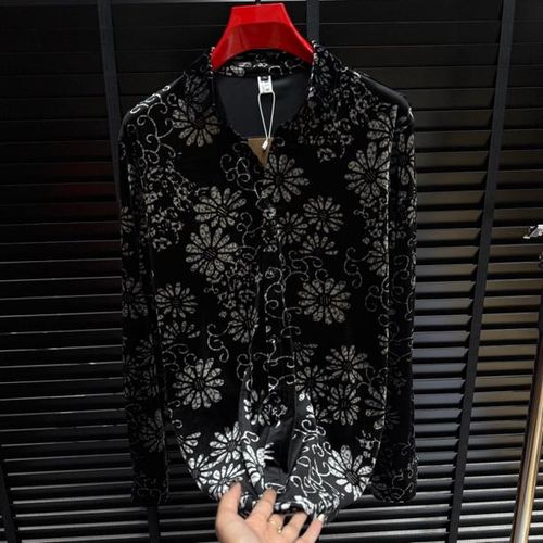Long-sleeved shirt with a white floral pattern on a black background—a unique,  quiet luxury  piece.