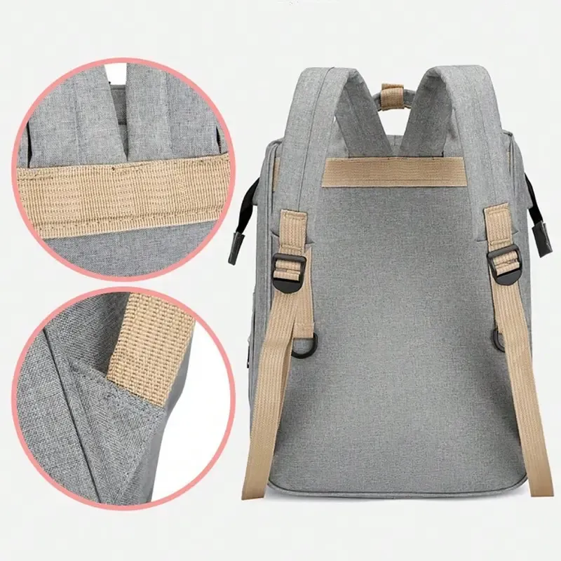 🛏️ All-in-one foldable baby crib bag with soft diaper pad for convenient care.