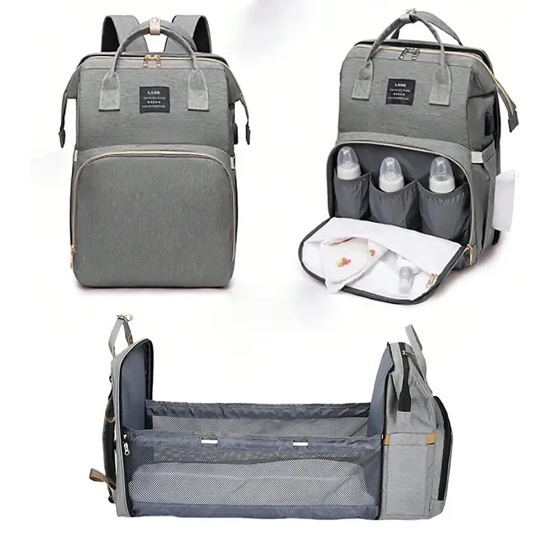 🛏️ All-in-one foldable baby crib bag with soft diaper pad for convenient care.