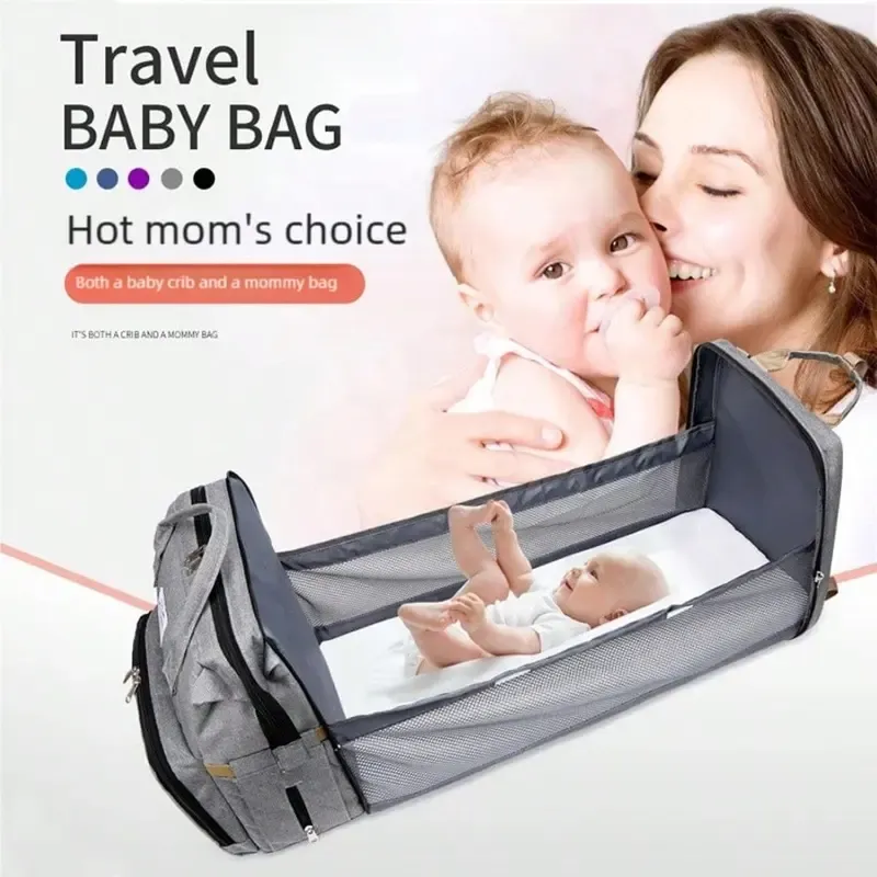 🛏️ All-in-one foldable baby crib bag with soft diaper pad for convenient care.