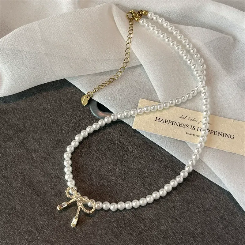 Bow pendant pearl necklace, a new versatile clavicle necklace accessory