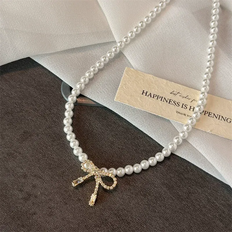 Bow pendant pearl necklace, a new versatile clavicle necklace accessory