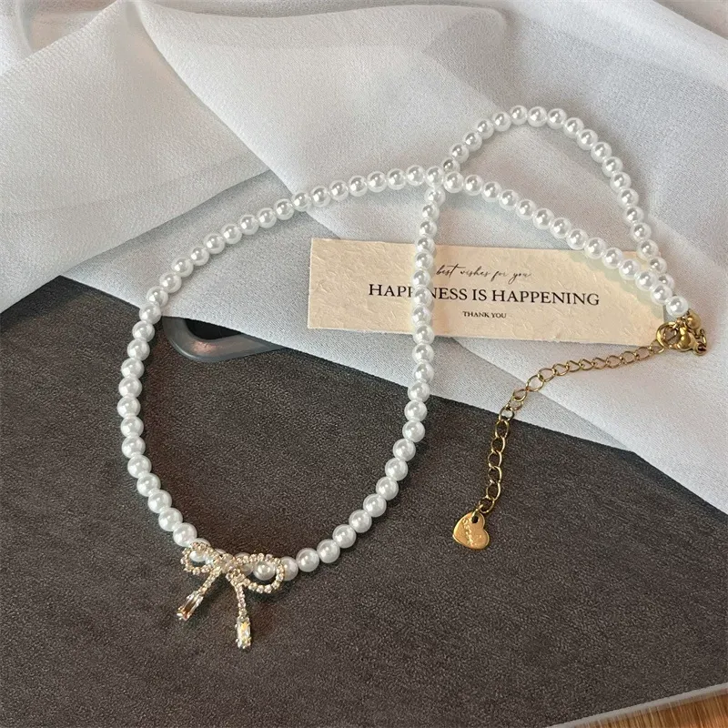 Bow pendant pearl necklace, a new versatile clavicle necklace accessory