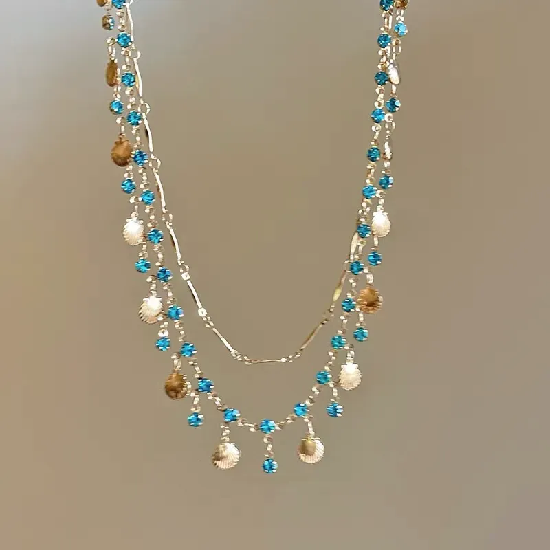 Daughter of the Sea ~ Blue Zircon Shell Necklace Bracelet