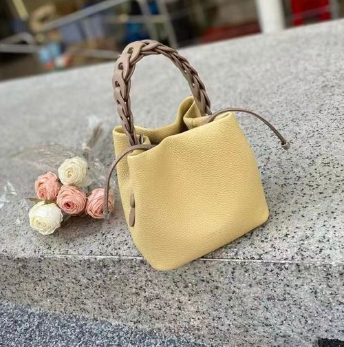 Niche design genuine leather bucket bag for women High-end exquisite woven handbag