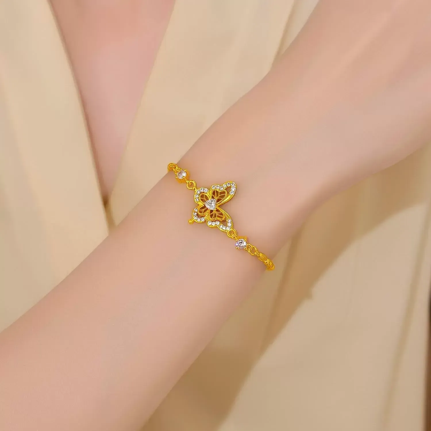 Women's butterfly openwork bracelet, a new elegant jewelry design for 2025, perfect as a gift for your girlfriend.