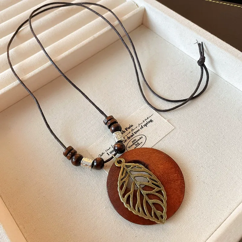 Round leaf hollow long necklace, retro literary temperament sweater chain