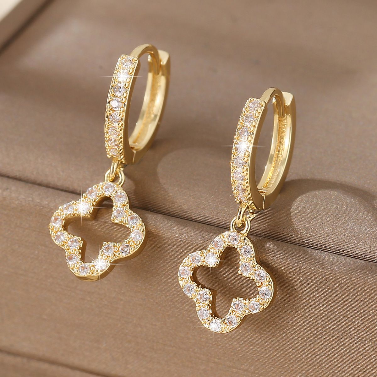 Fashionable hollow flower earrings