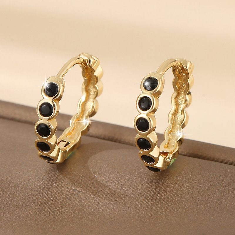 Copper inlaid colored zircon round earrings