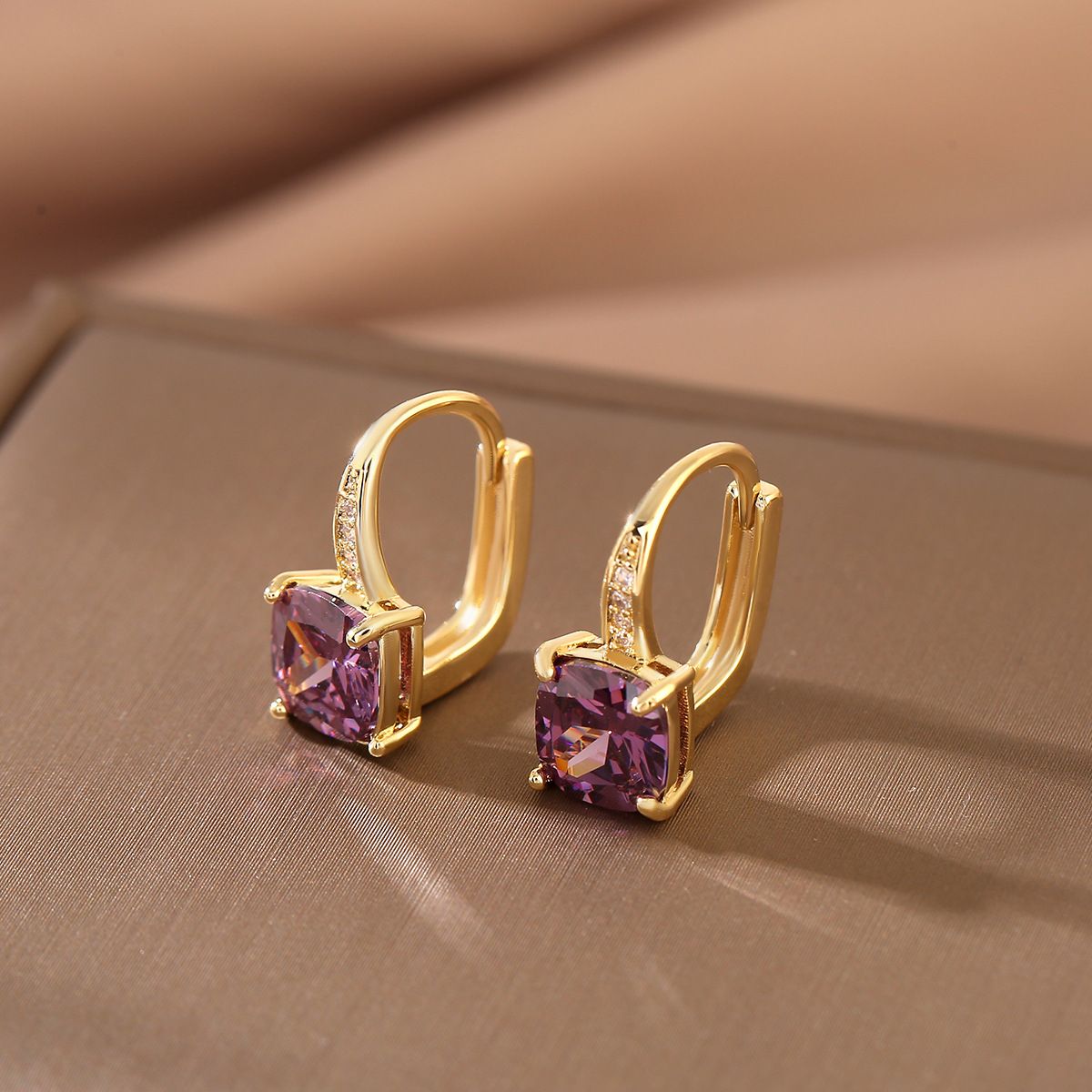 Purple zircon earrings