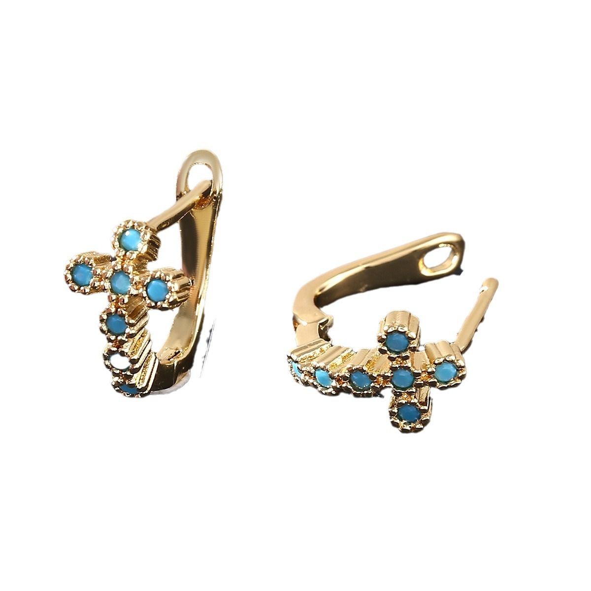 Copper inlaid zirconium cross ear buckle