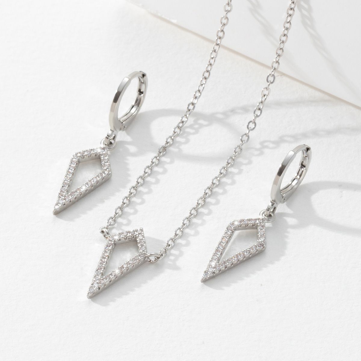 Prism shaped zirconium necklace earring set