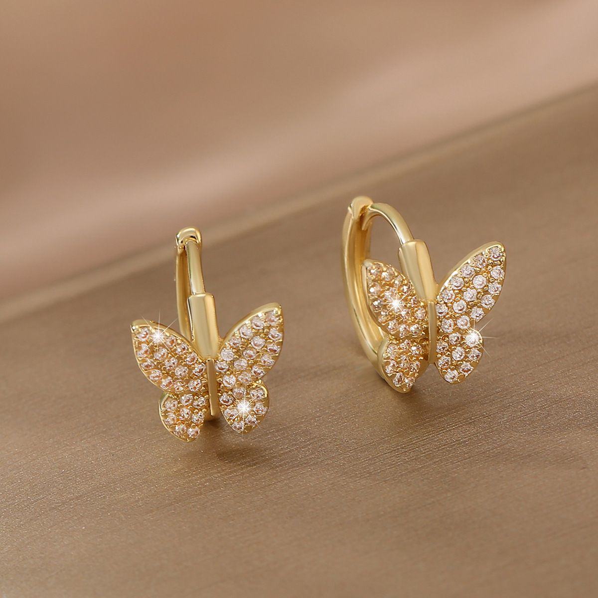 Fashionable copper inlaid zirconium butterfly earrings