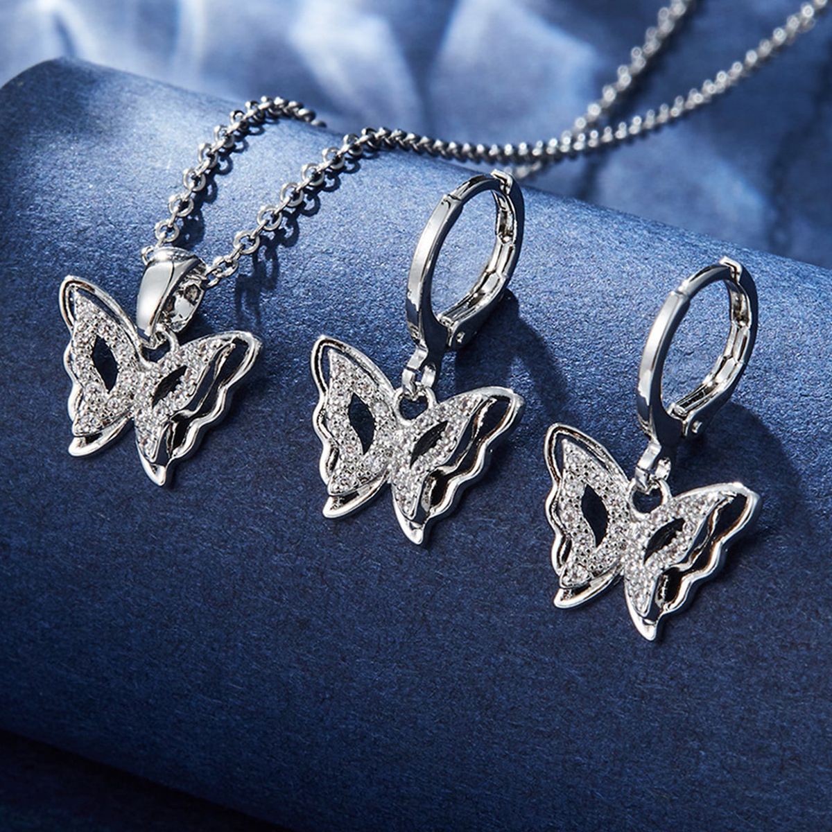 Butterfly pendant earrings