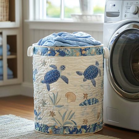 Coastal Calm Quilted Laundry Basket NCU0DV705