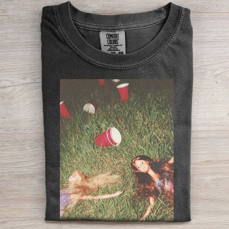 INJURED BARBIECORE GRASS TEE