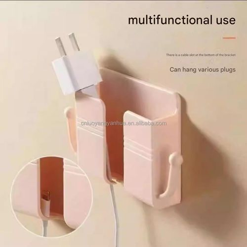 Check it out! This wall-mounted gadget is great at storing remote controls and mobile phones