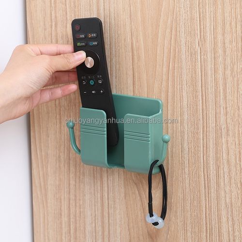 Check it out! This wall-mounted gadget is great at storing remote controls and mobile phones