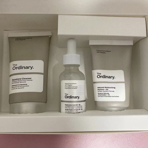 Daily skincare set, including facial cleanser, serum, and moisturizer.