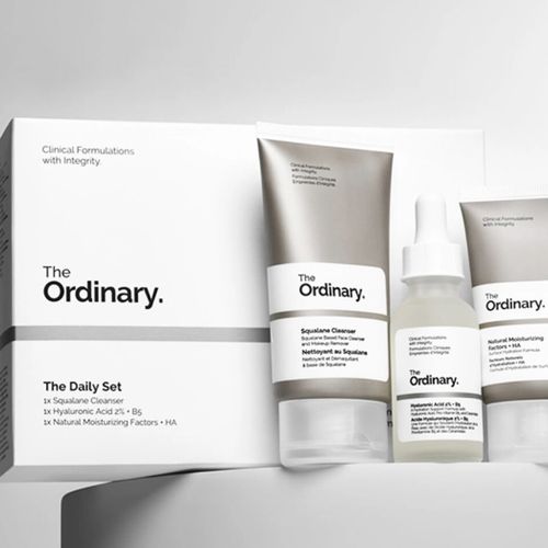 Daily skincare set, including facial cleanser, serum, and moisturizer.