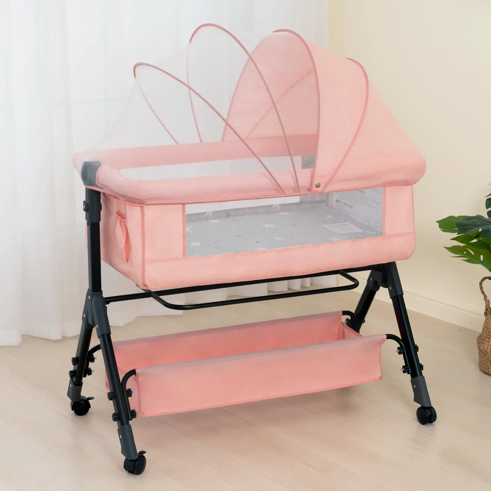 Baby cradle with storage basket and mosquito net