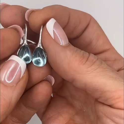 Bestselling teardrop diamond earrings with a sleek minimalist design, blending timeless fashion appeal and everyday elegance for the modern style lover