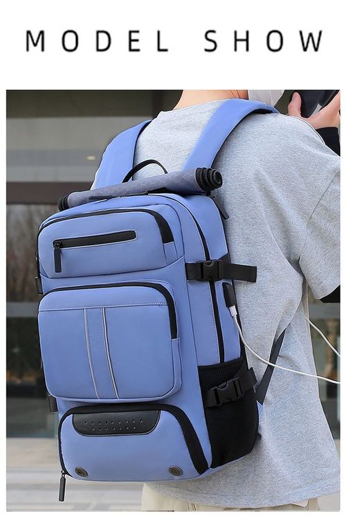 Business-style blue laptop backpack, waterproof material, large capacity design, suitable for all users.