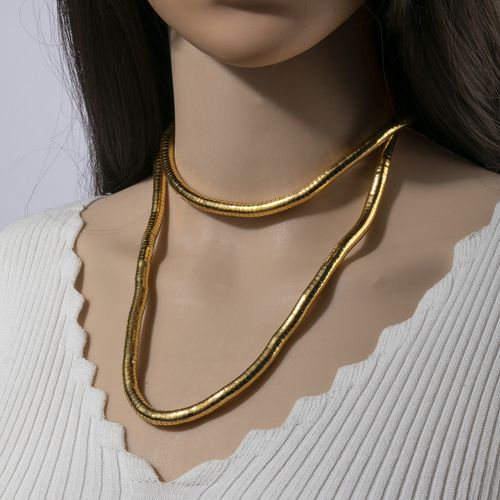 Flexible, bendable snake-style necklace—a versatile, shapeshifting piece that can be worn as a choker or a bracelet.