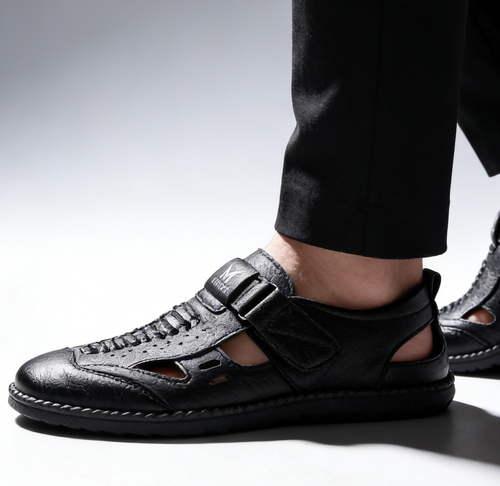 Men's leather slip-on shoes made of genuine cowhide, highly durable and with perforated design.