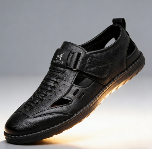 Men's leather slip-on shoes made of genuine cowhide, highly durable and with perforated design.