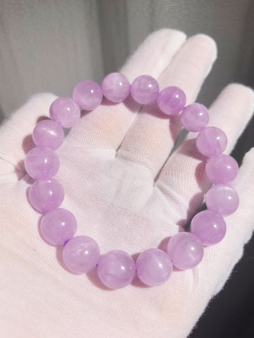 Natural purple lithium feldspar bracelet. High-quality lavender-colored crystal queen.