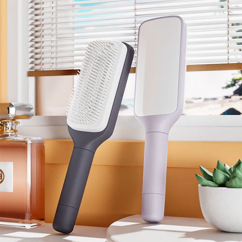 Retractable massage comb