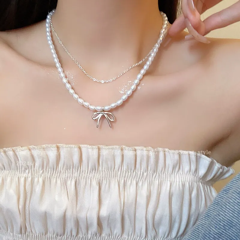 Bow Pearl Double-Layer Necklace for Women – Light Luxury Elegant Design